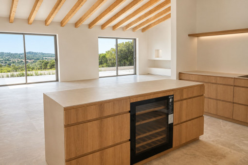 Open-plan kitchen with island and Bosch appliances