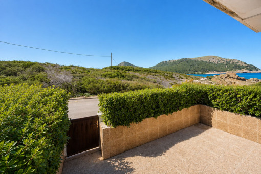 Private terrace with views over the greenery towards the sea