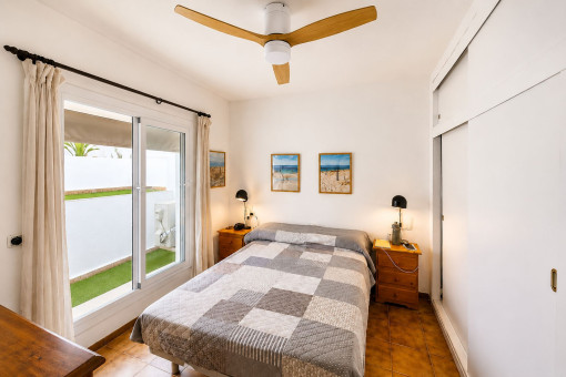 Bright bedroom with double bed