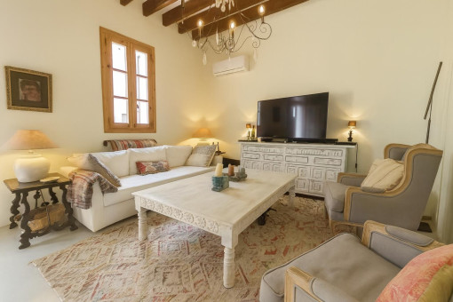 Bright cozy living room with TV