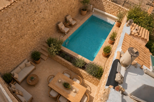 Private pool with outdoor seating area