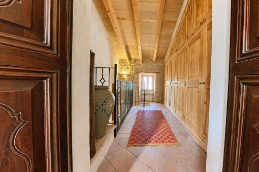 Rustic hallway with wooden cabinets