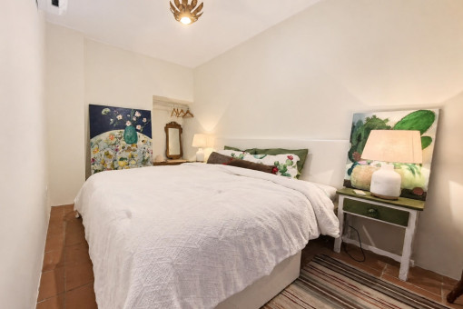 Small cozy bedroom with art decor
