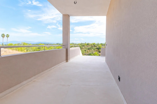 Spacious covered terrace of the modern villa