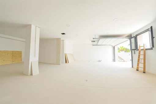 Spacious garage with room for three vehicles