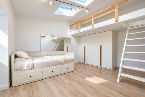 Cosy bedroom with mezzanine