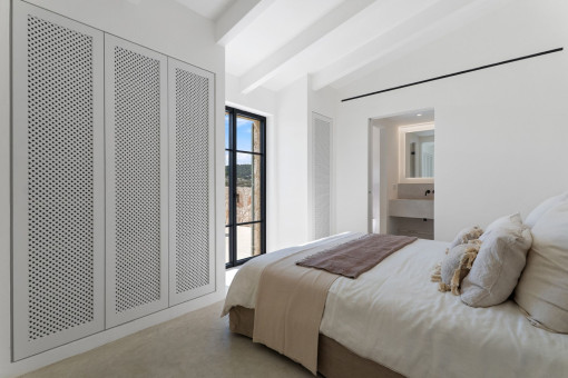 Cosy bedroom with built in wardrobes