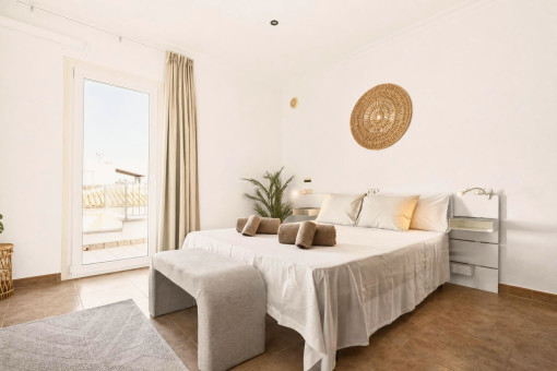 Second bedroom upstairs with balcony