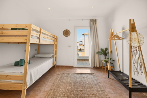 Fourth bedroom upstairs with balcony